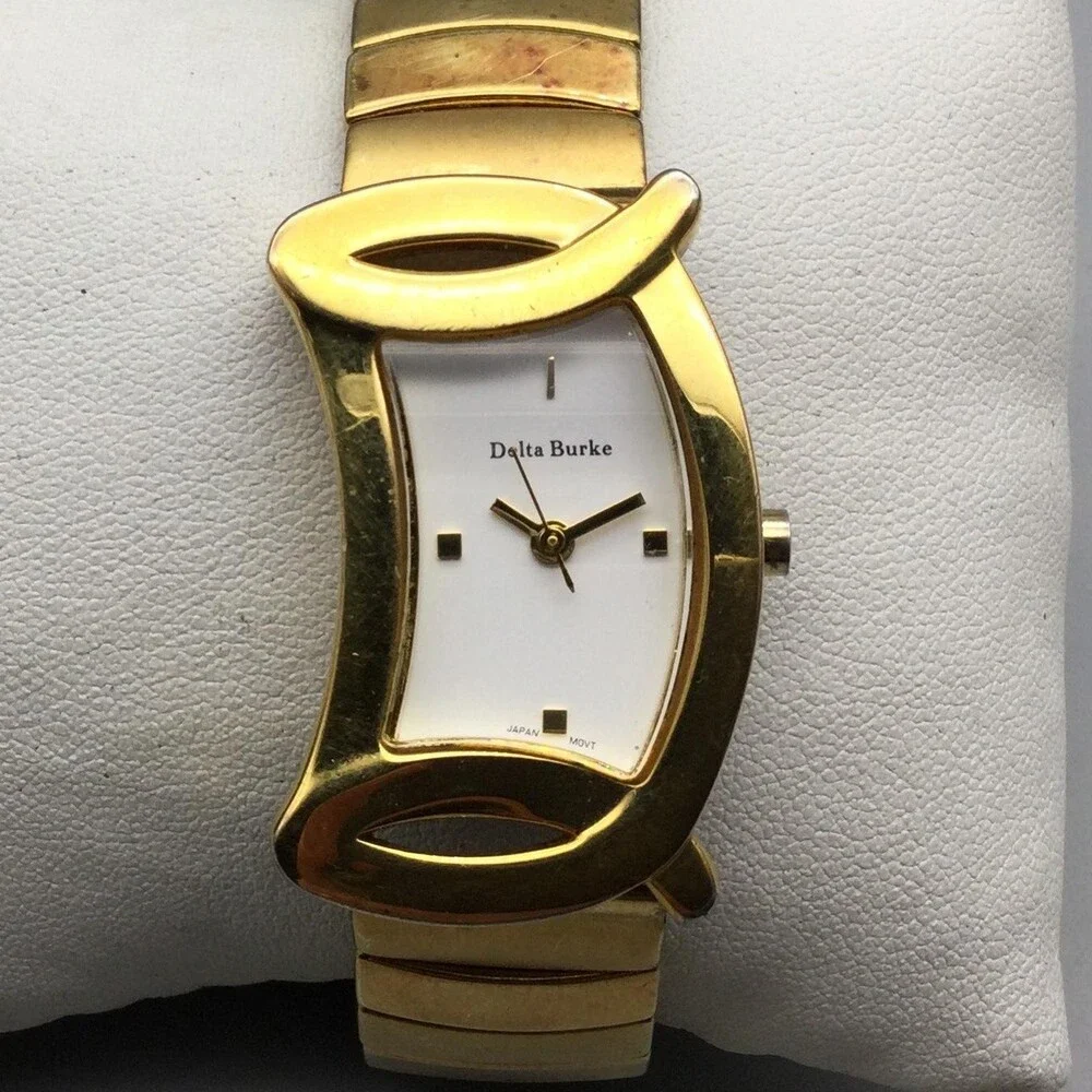 Delta Burke Womens Watch 25mm Gold Tone Asymmetrical Stretch Band New Battery